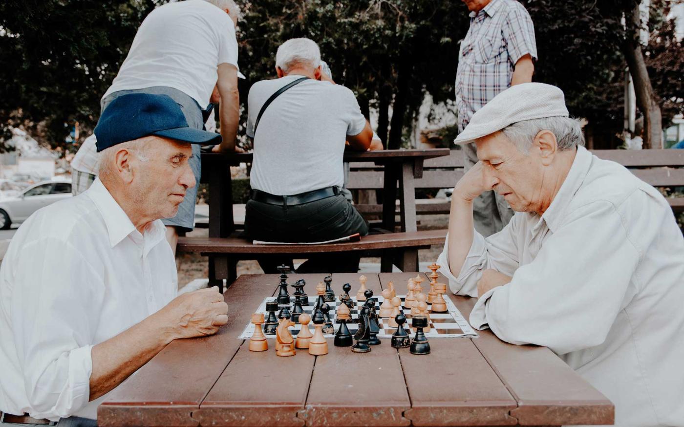 Two seniors playing chess